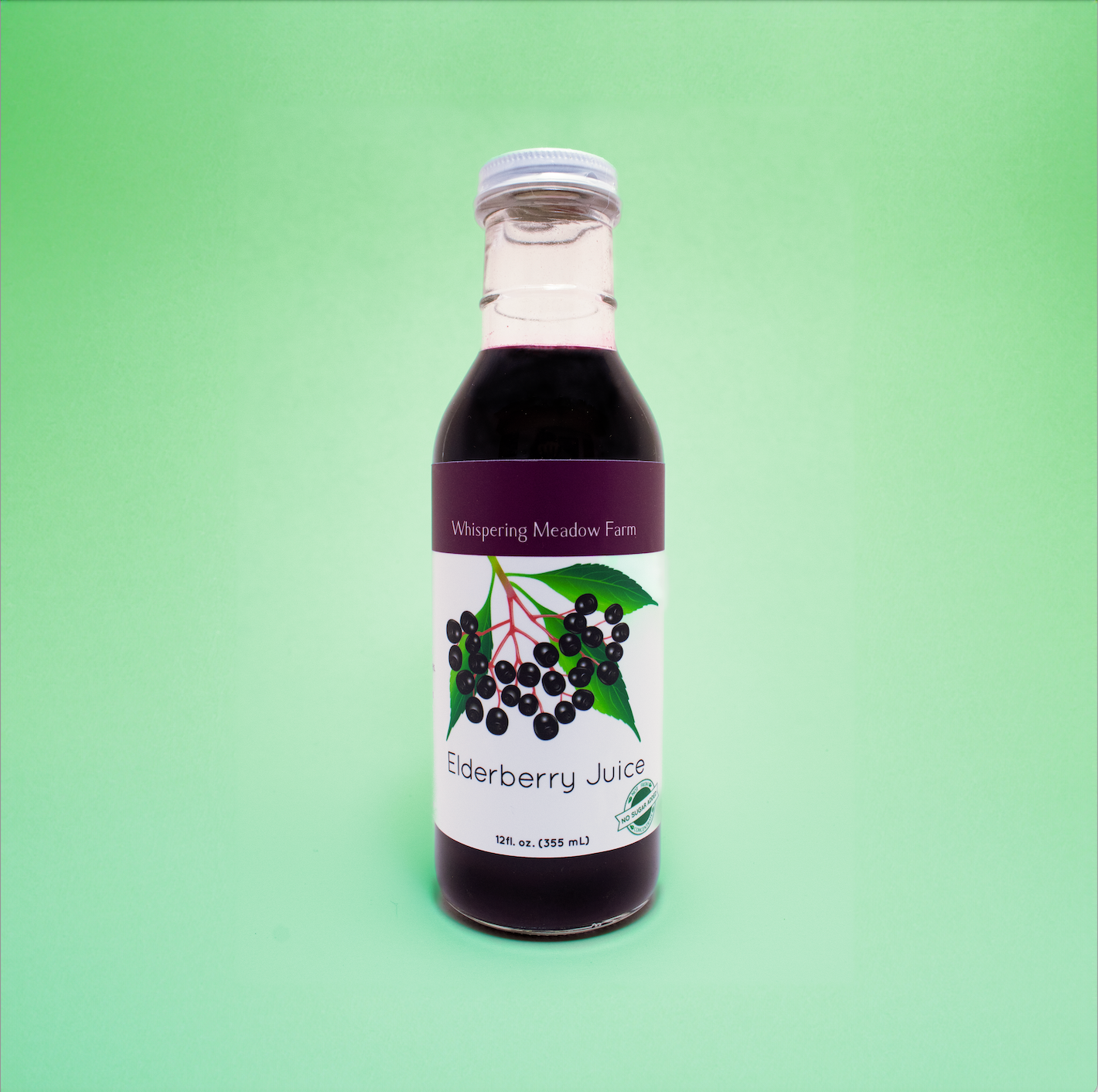 Product Image. 12 fluid ounces of bottled Elderberry Juice.