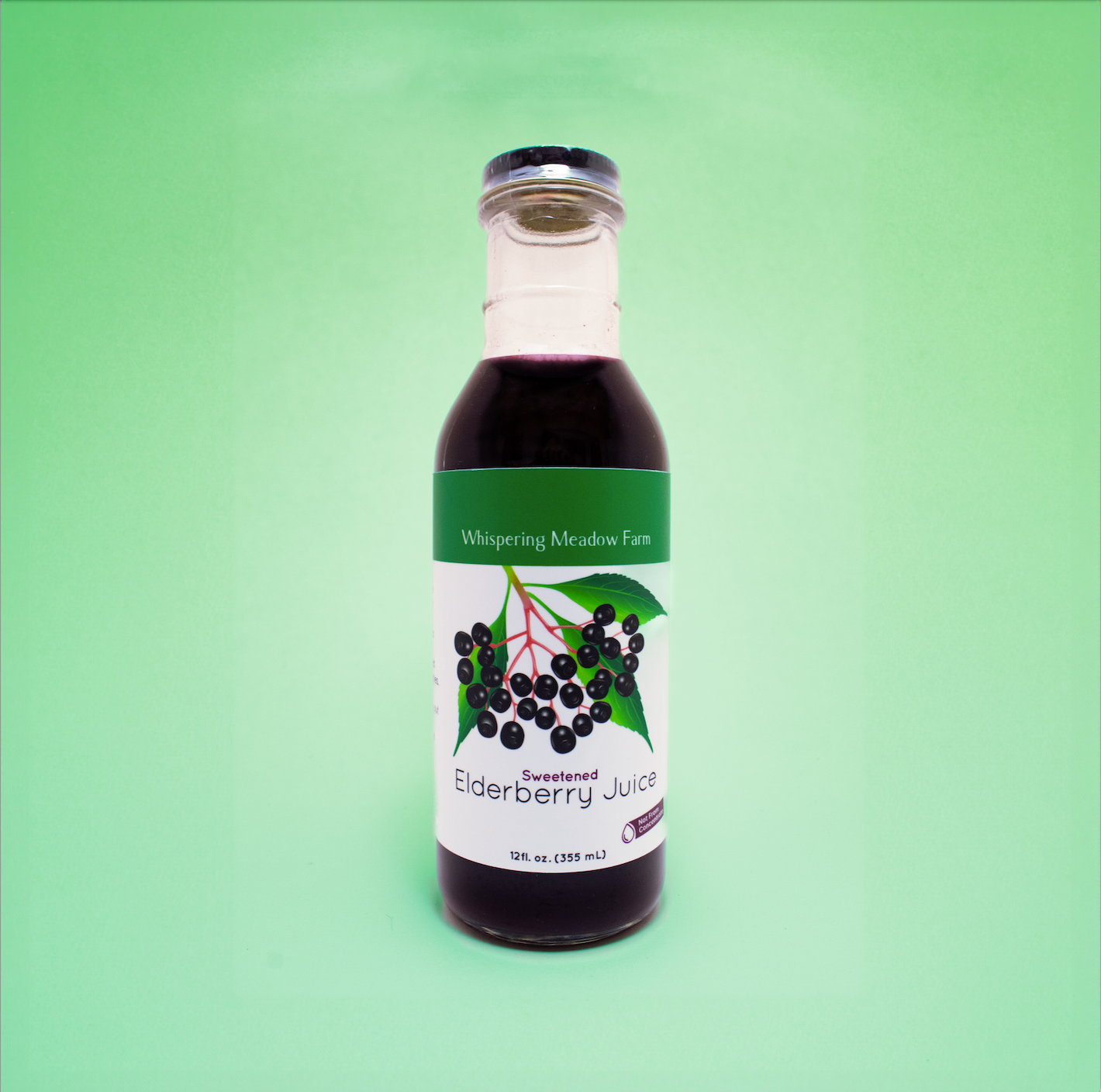 Product Image: 12 fluid ounces of bottled Sweetened Elderberry Juice. 