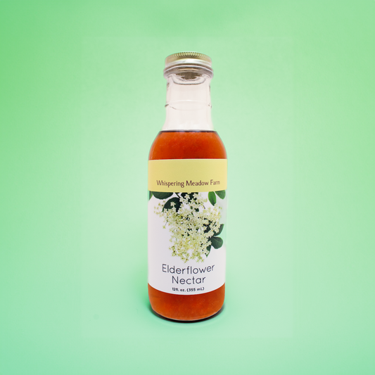 Product Image of 12 fluid ounce bottle of orange Elderflower Nectar.